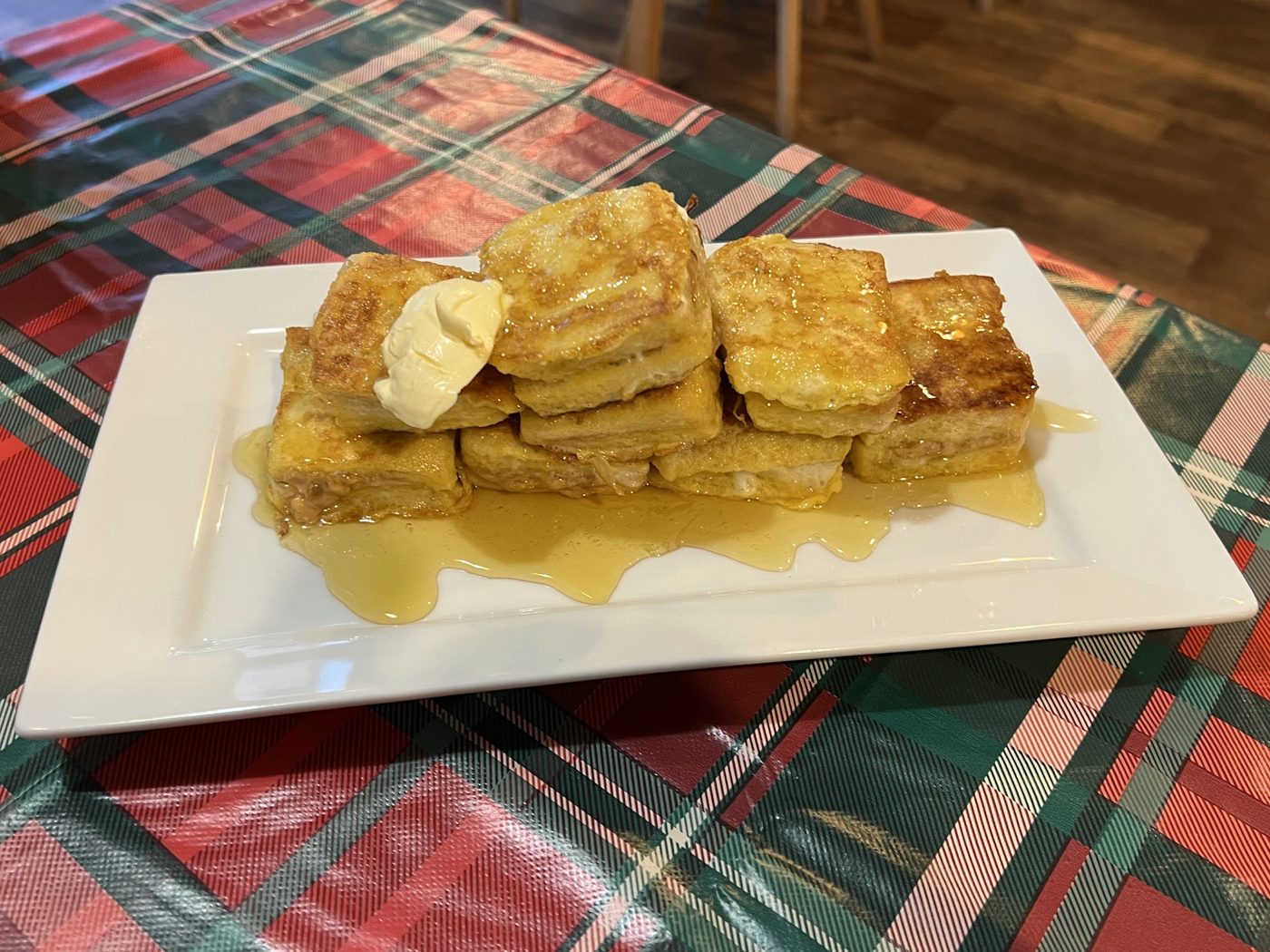 Golden French toast squares with syrup